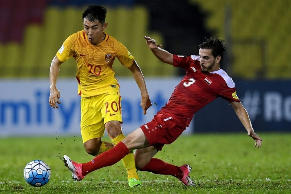 Syria's late equaliser left China's world cup hopes hanging by a thread. AFP