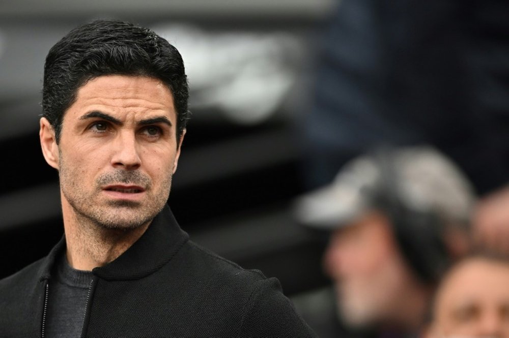 Mikel Arteta signs new contract at Arsenal. AFP