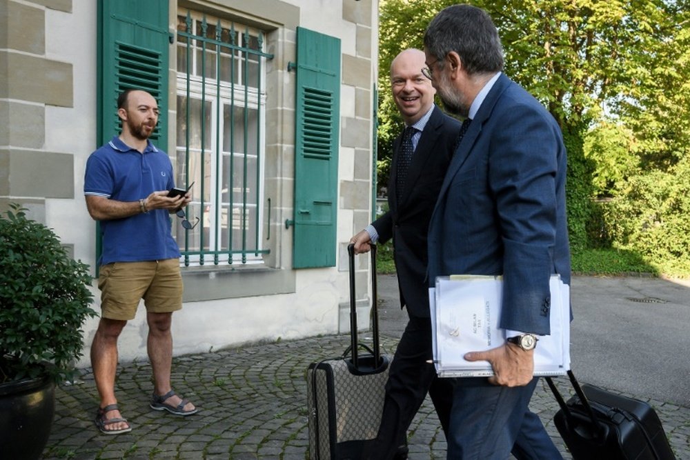 Milan are challenging the ruling. AFP