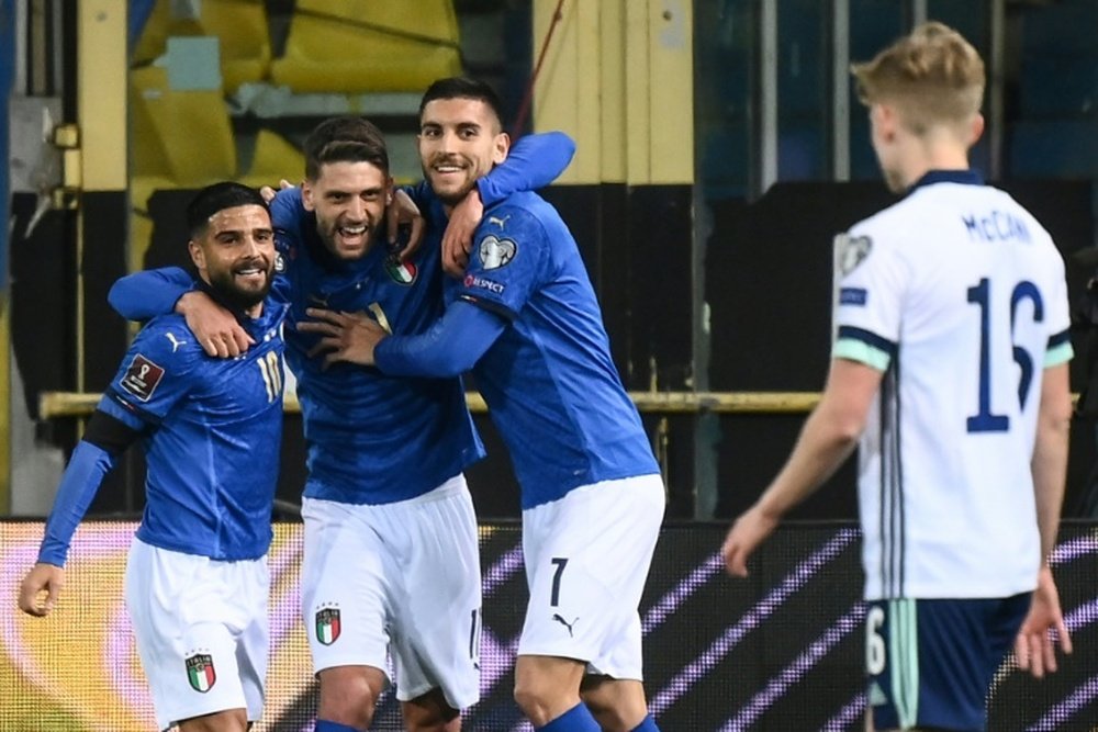 Domenico Berardi (2L) scored as Italy beat Northern Ireland 2-0. AFP