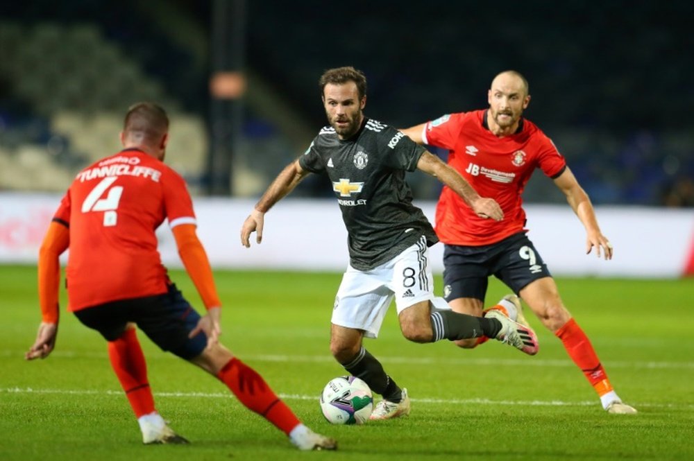 United beat Luton 3-0. AFP