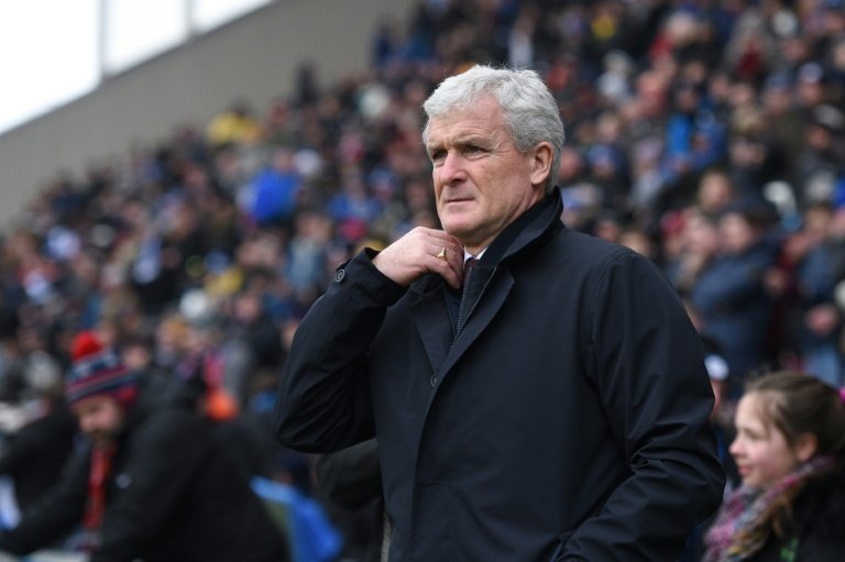 Hughes hopes Southampton can leapfrog West Ham on Saturday. AFP