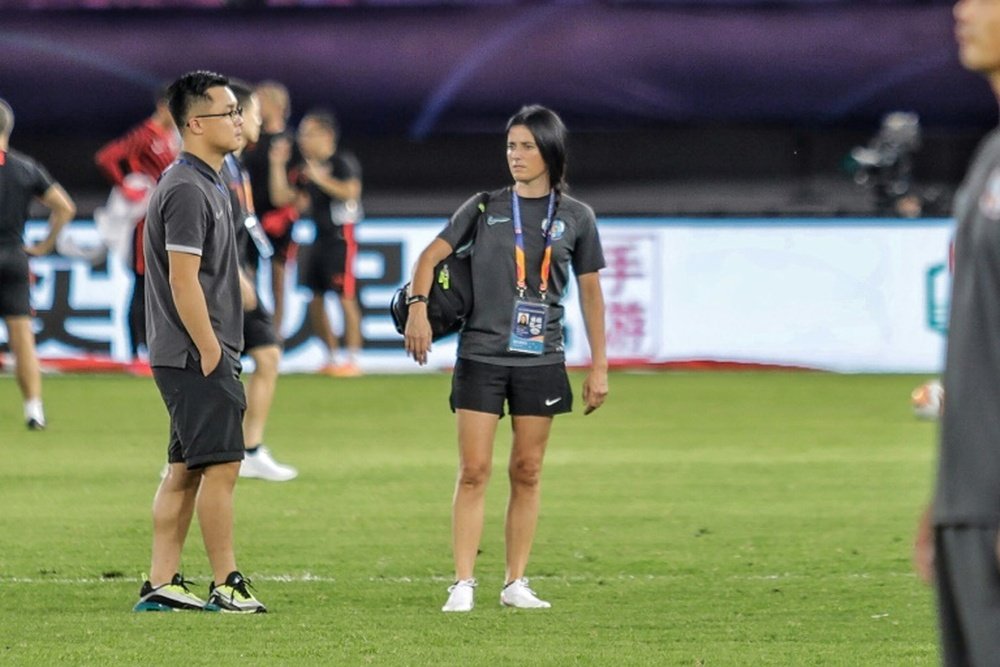 'First woman physio' breaks down barriers in China football. AFP