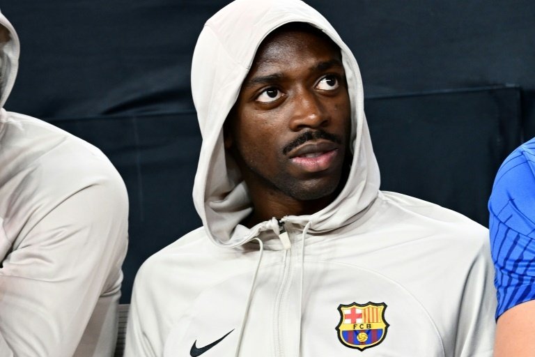 Xavi Hernandez confirmed Dembele's move to PSG. AFP