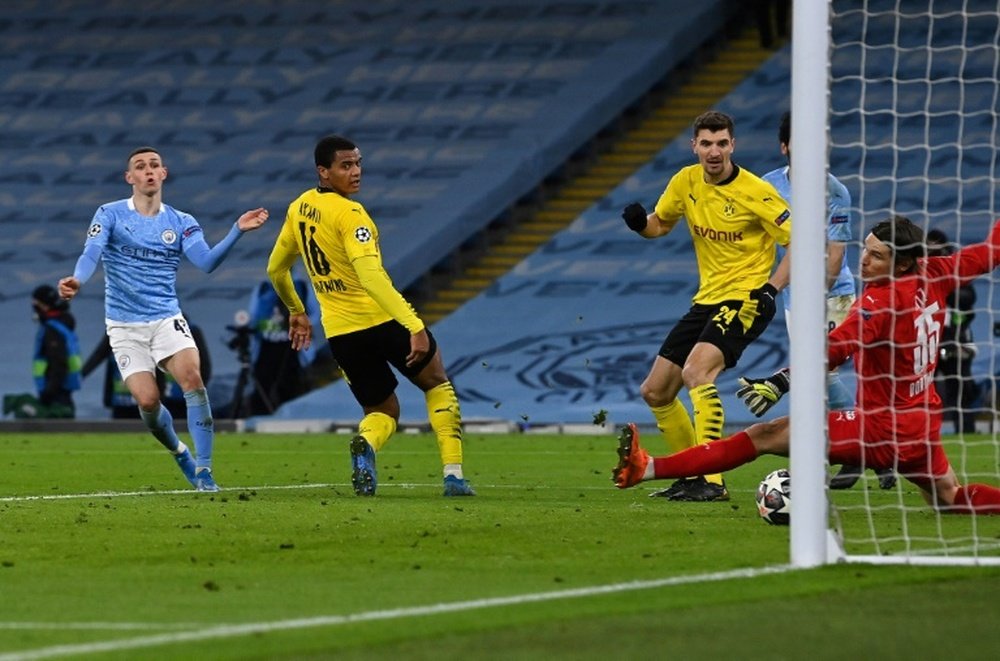 Phil Foden (L) got the winner for Man City right at the death. AFP