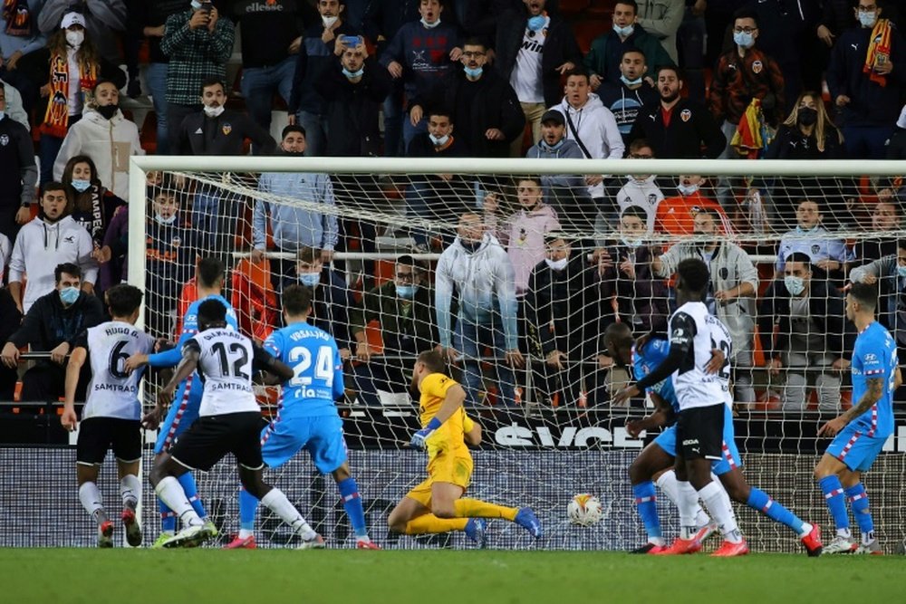 Hugo Duro scored twice in stoppage time to give Valencia a 3-3 draw. AFP