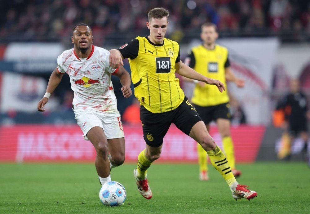 Schlotterbeck (R) will be out for the rest of the season with a knee injury. AFP