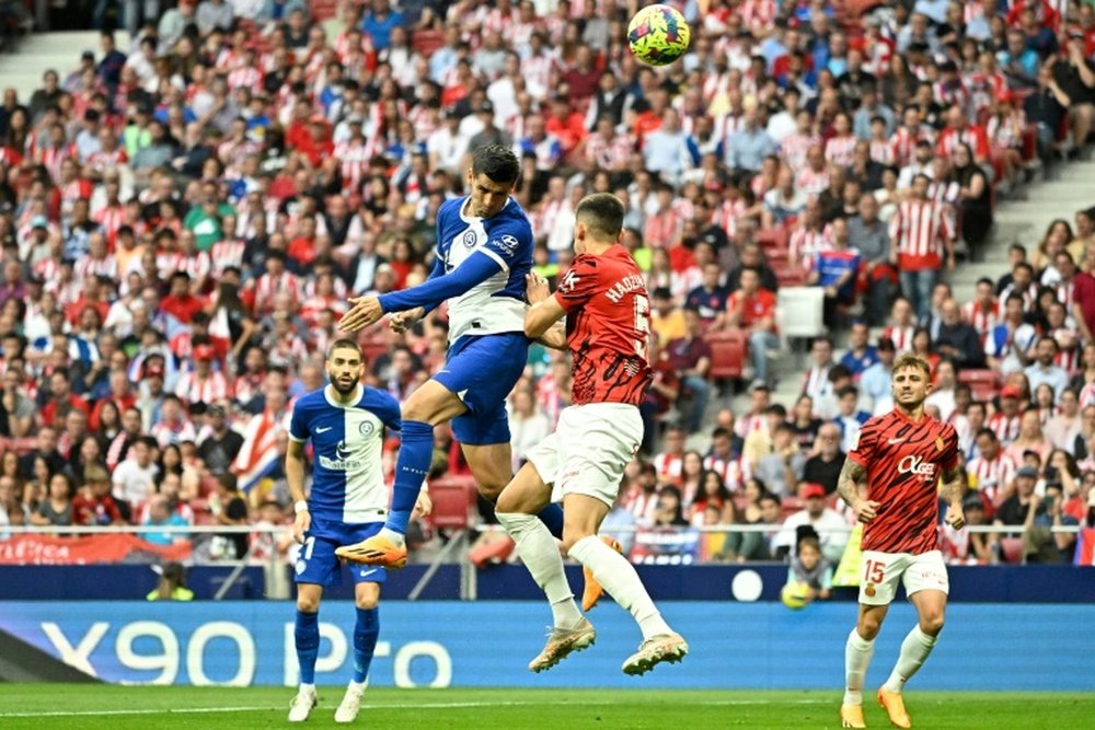 Atletico survive scare to win on birthday. AFP