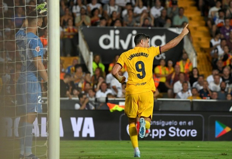 Barcelona's Lewandowski netted twice in the win over Valencia on Saturday. AFP