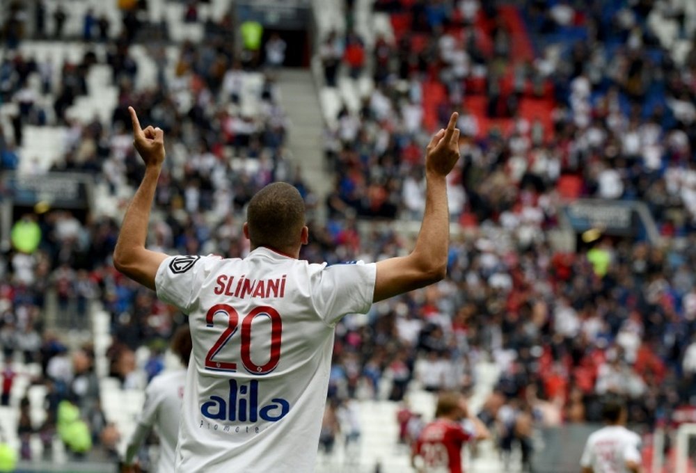 Slimani was on target for Lyon as they were held by Brest. AFP