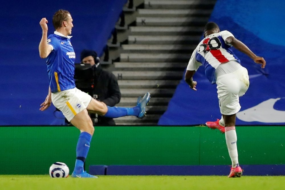 Christian Benteke (right) snatched a 2-1 win for Crystal Palace. AFP