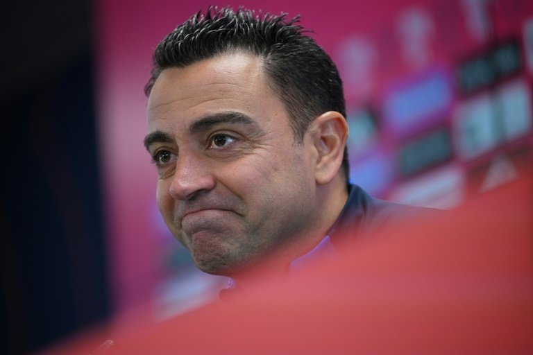 Barca's Xavi expecting 'wounded' Madrid to wage war