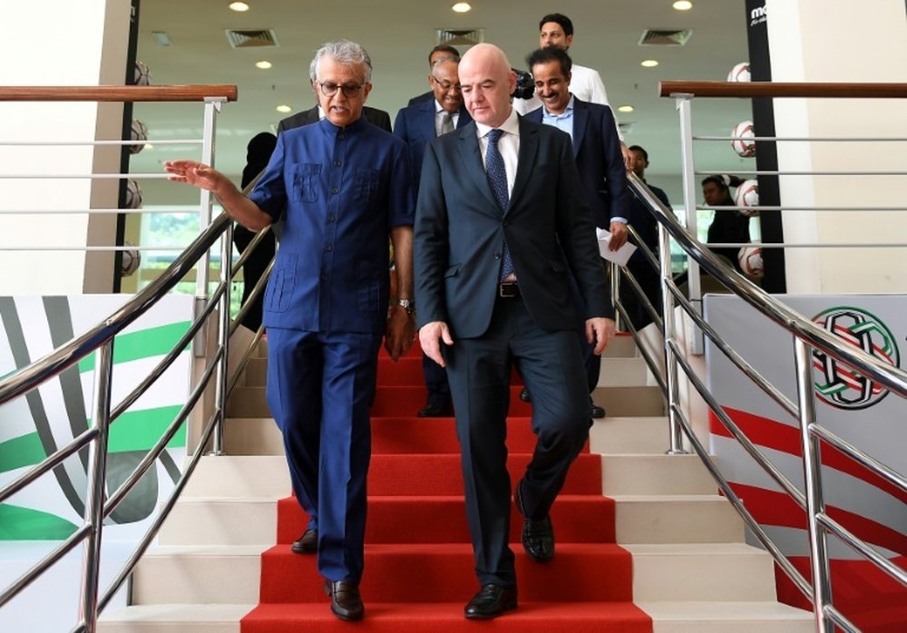 Sheikh Salman bin Ebrahim Al Khalifa pictured with FIFA president Gianni Infantino. AFP