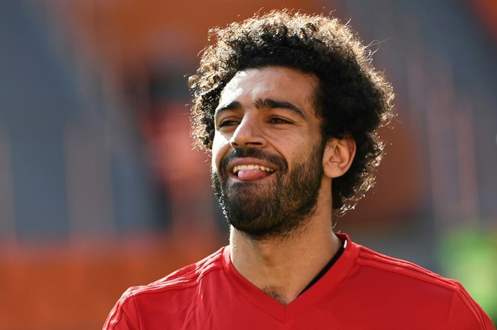 Salah is aiming to return to action against Russia. AFP