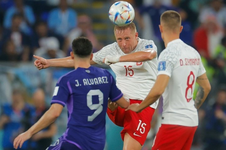Poland coach savours World Cup knock-out spot after nervy finale