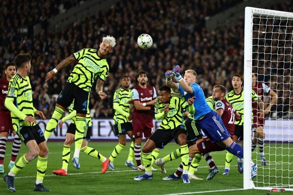 Ben White (2nd left) scored an own goal in Arsenals 3-1 League Cup defeat to West Ham. AFP