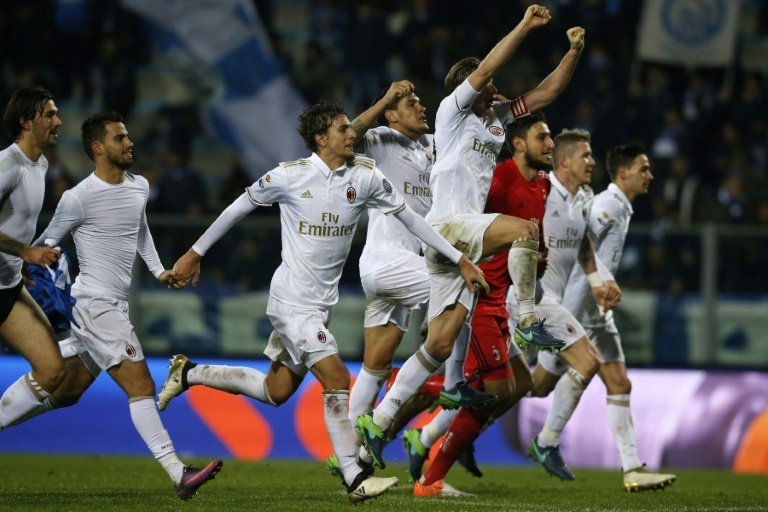 Milan football motors into second