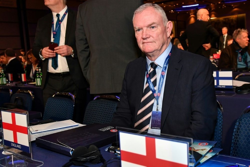 Greg Clarke believes matches will be held behind closed doors for many months. AFP