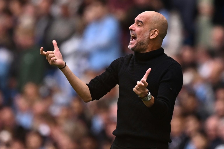 Guardiola urges Grealish and Doku to fight for City place