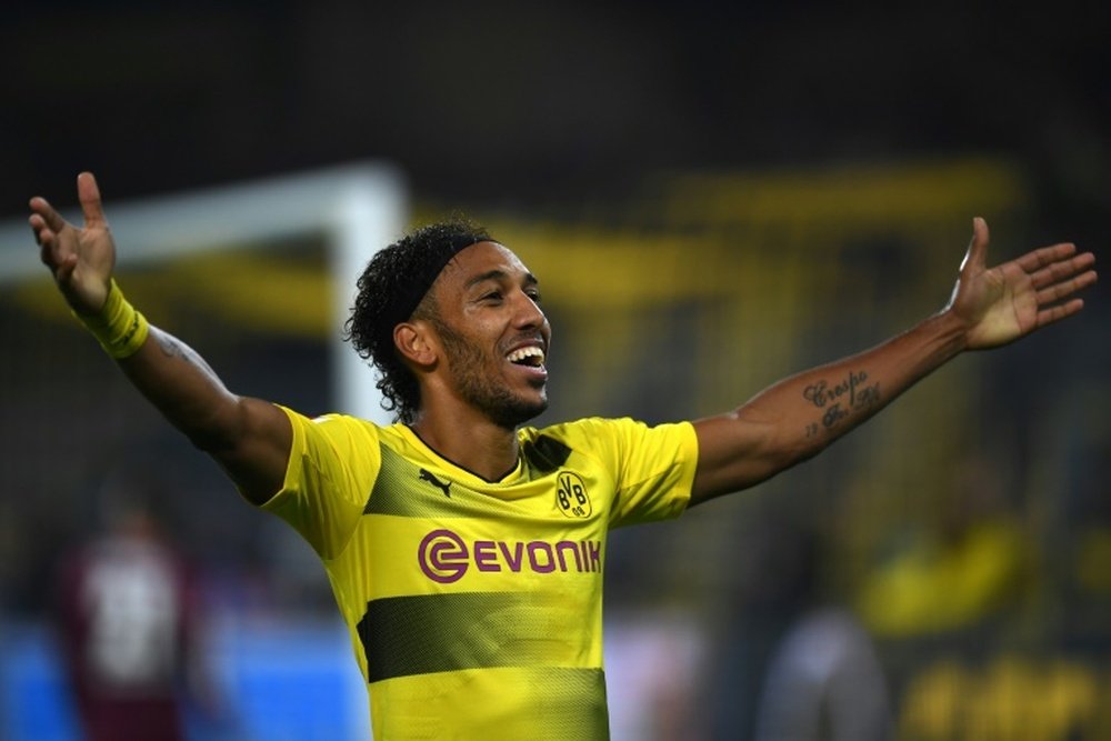 Aubameyang's hat-trick sent his side top of the Bundesliga. AFP