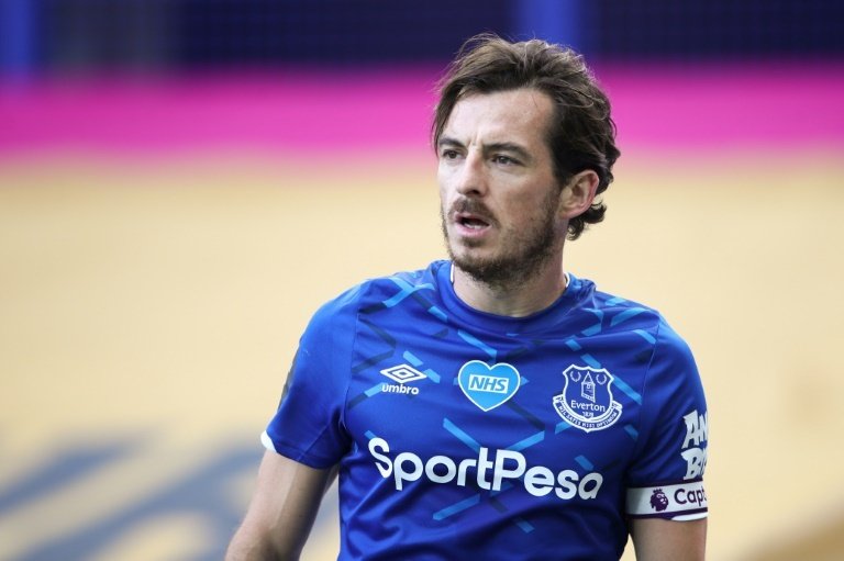 Everton defender Baines retires