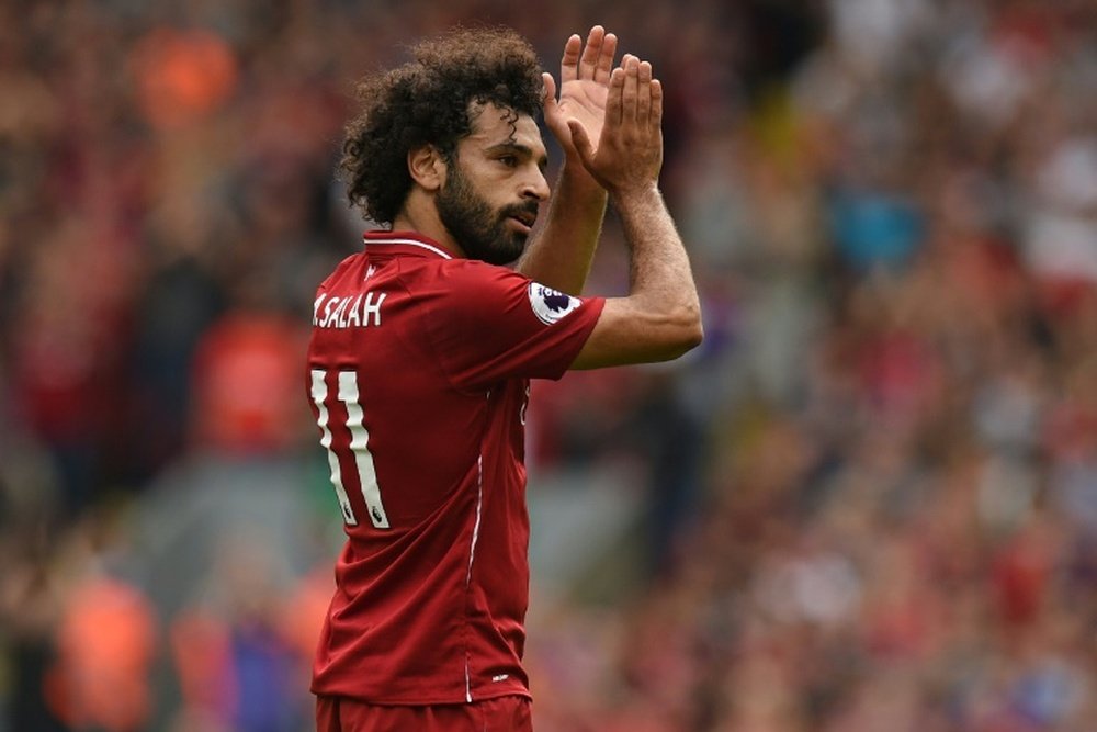 Salah is up and running. AFP