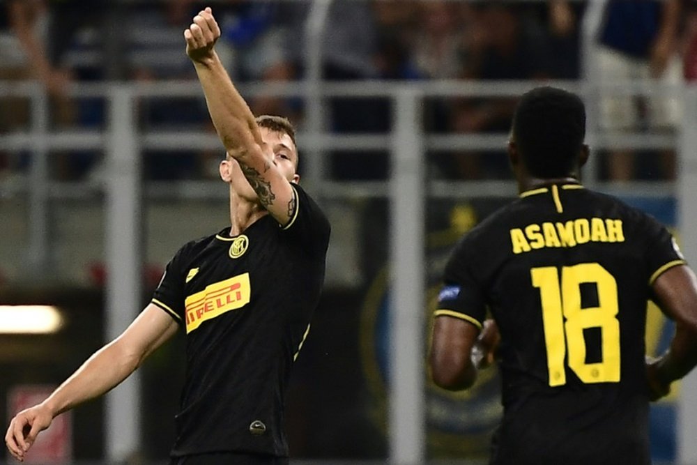 Barella (L) rescued a point late on for Inter Milan. AFP