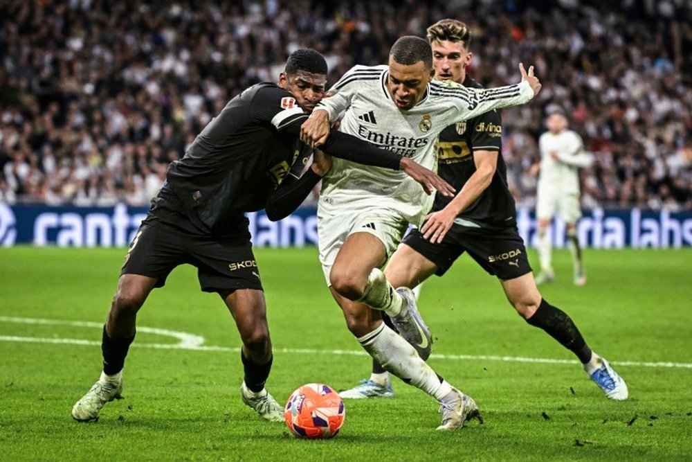 Mbappe (C) carved out enough chances to win, but wasted opportunities. AFP