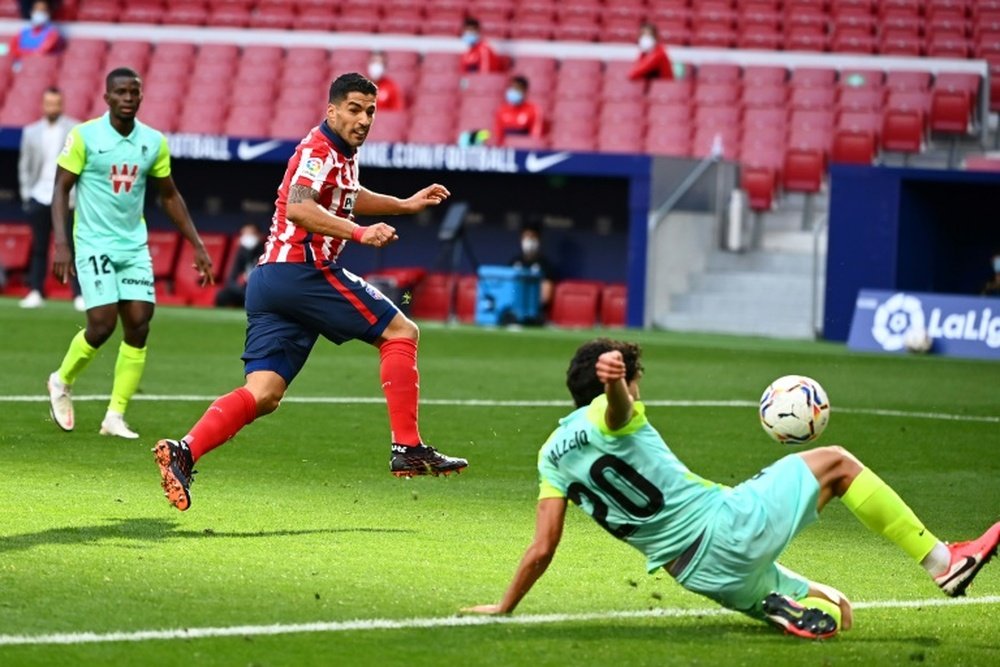 Luis Suarez had an impressive 20-minute debut as Atlético beat Granada 6-1. afp_en