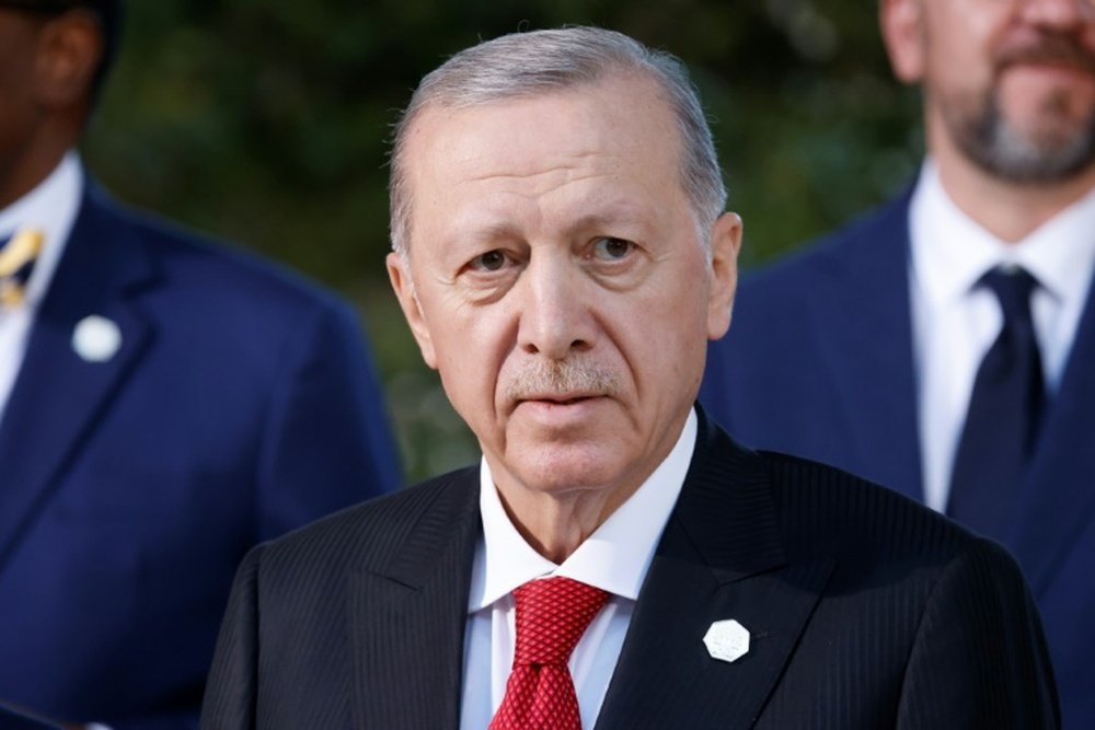Erdogan will attend his country's Euro 2024 quarter-final against the Netherlands. AFP