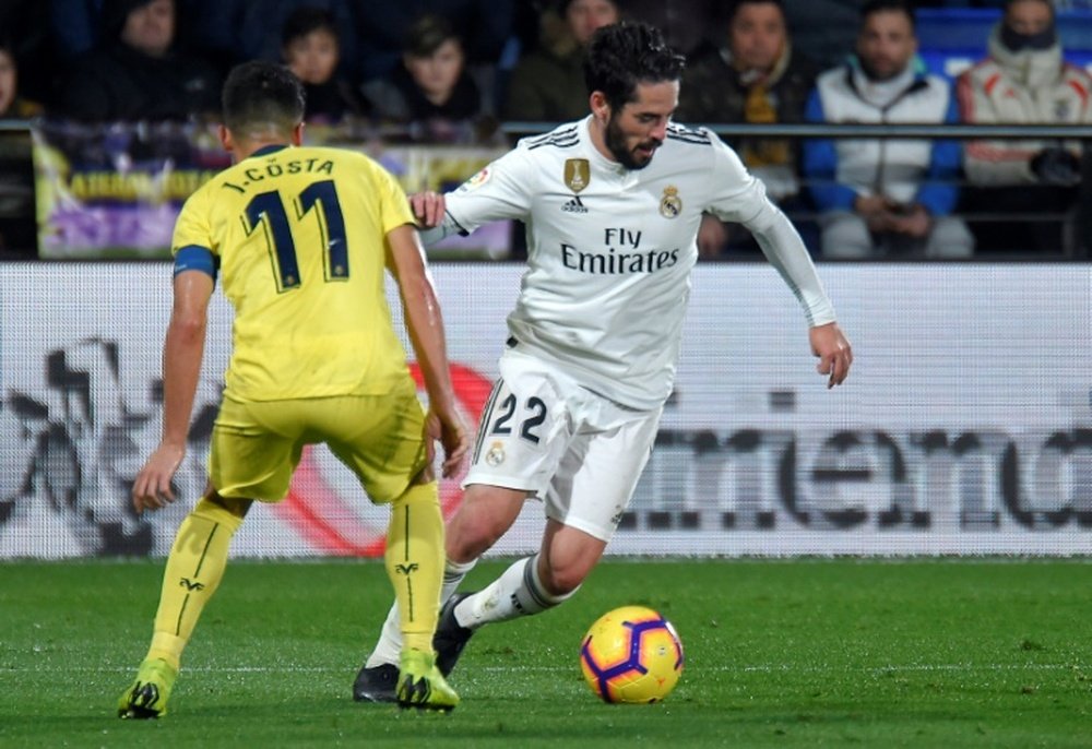 Isco (R) hasnt started a league game since Santiago Solari took over as Madrid. AFP