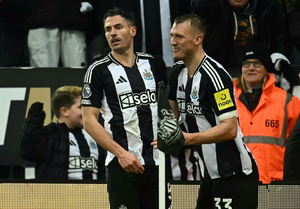 Newcastle's Fabian Schar (L) scored against Liverpool on Wednesday. AFP