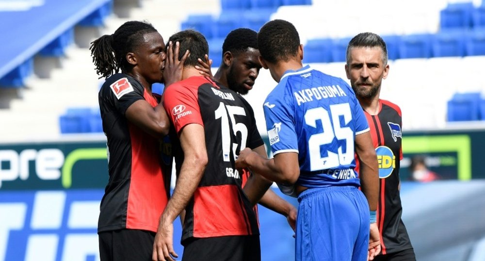 Calls for Bundesliga to 'tighten up' hygiene after hugs, kisses AFP