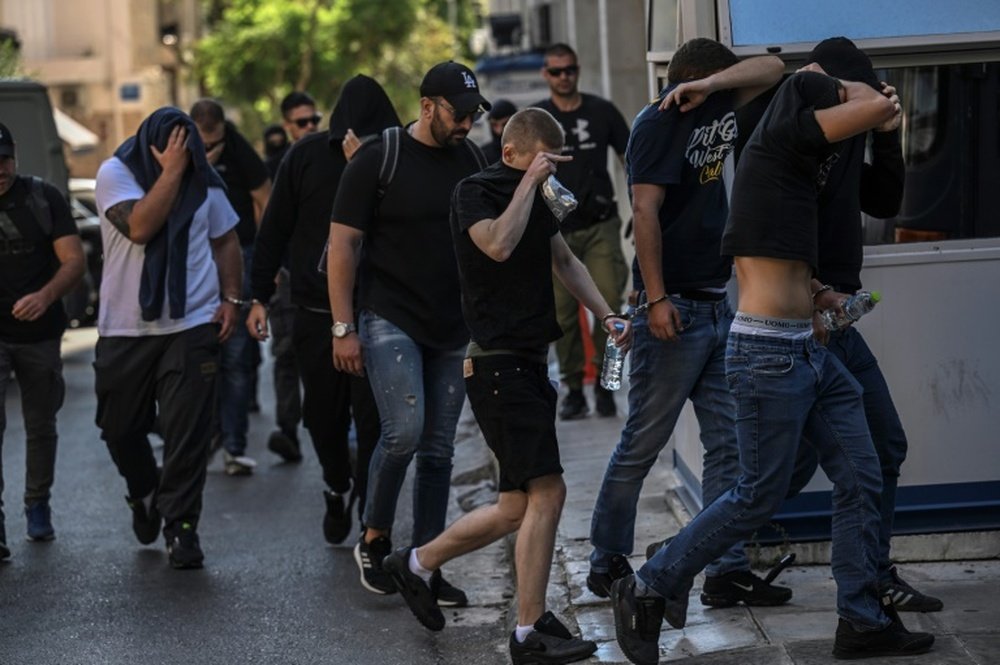 35 people have been charged by Greek authorities. AFP