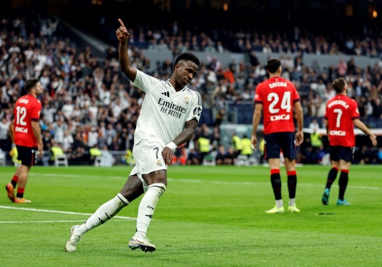 Vinicius treble helps Real Madrid crush Osasuna. AFP