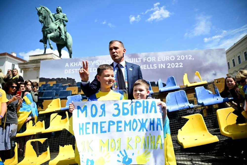 Shevchenko unveiled a section of seating from the stadium in Kharkiv damaged by the war. AFP