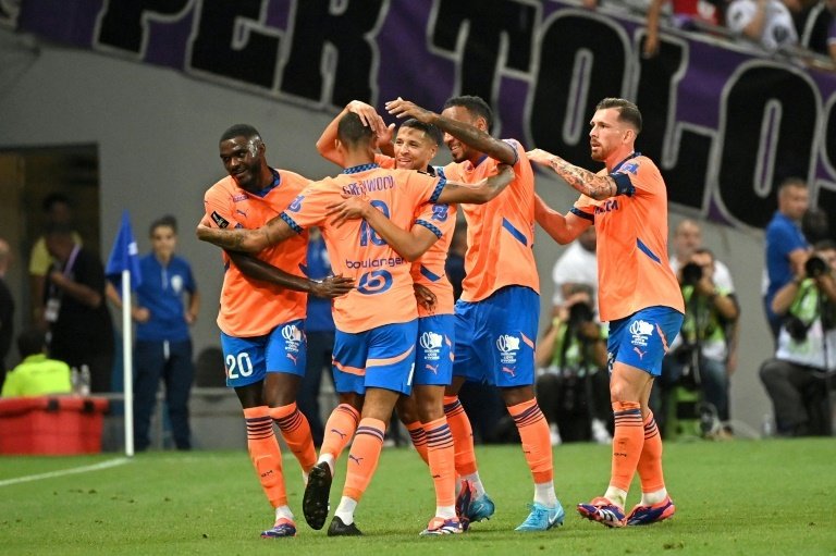 Mason Greenwood was mobbed by his teammates after scoring for Marseille. AFP