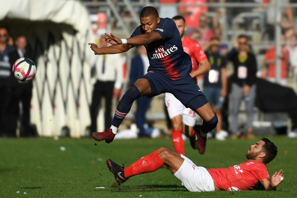 Kylian Mbappe will miss PSG's match against AS Saint-Étienne through suspension. AFP