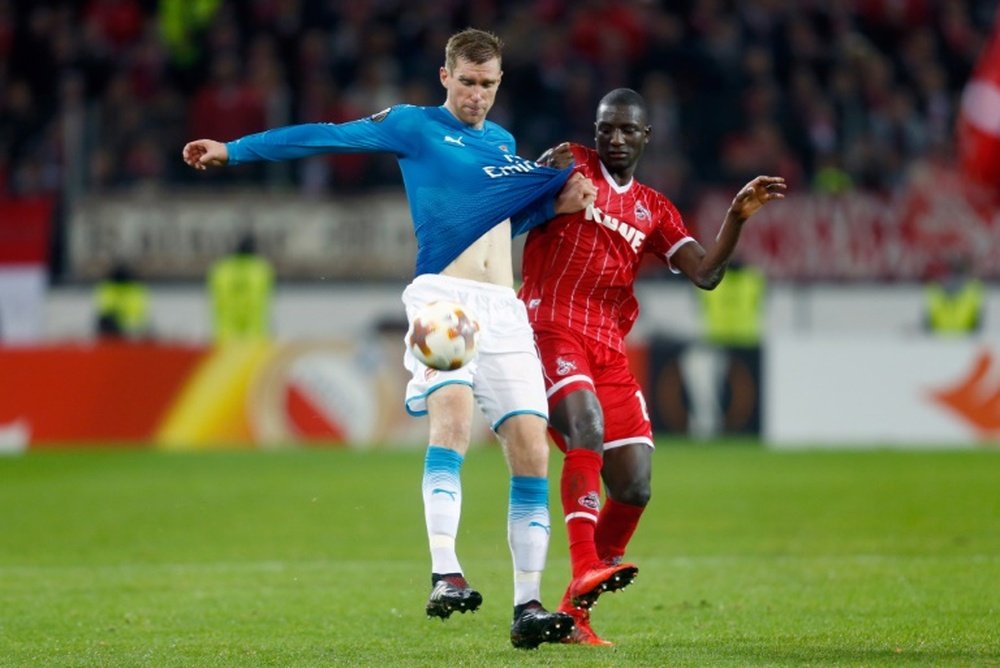 Mertesacker was brought to Arsenal by Wenger in 2011. AFP