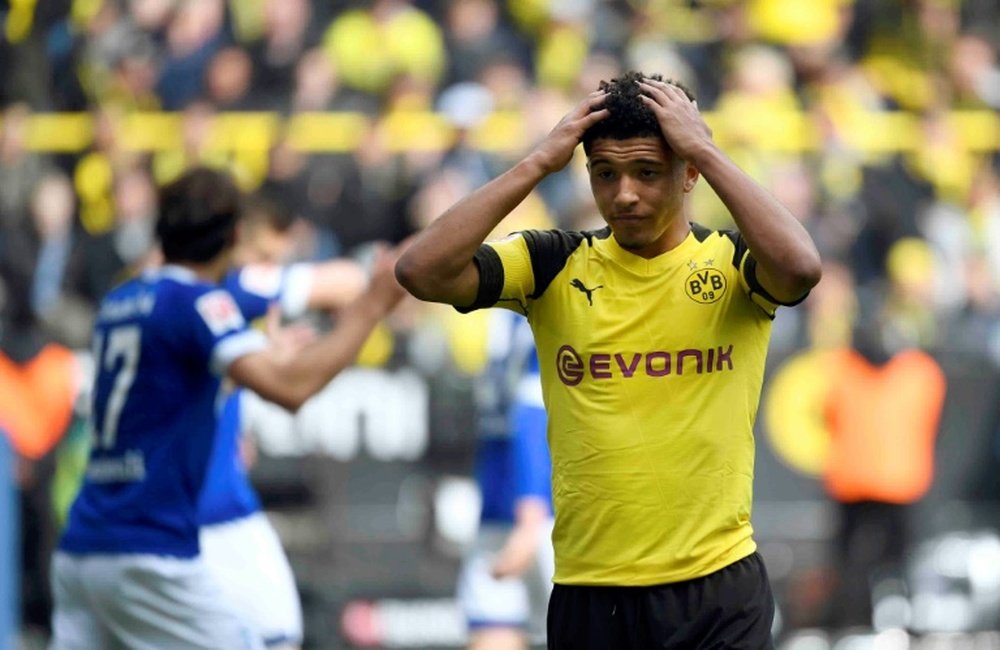 Jadon Sancho is seemingly going to be out of this weekend's key match against Dusseldorf. AFP