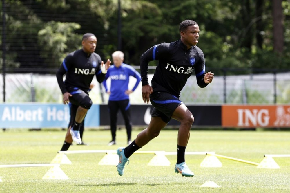 United complete the signing of Tyrell Malacia. AFP