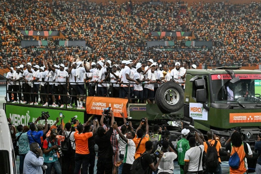 Tens of thousands of jubilant fans crammed the streets of Abidjan. AFP