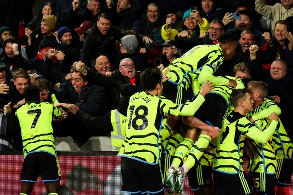 Arsenal are top of the Premier League after 13 games. AFP