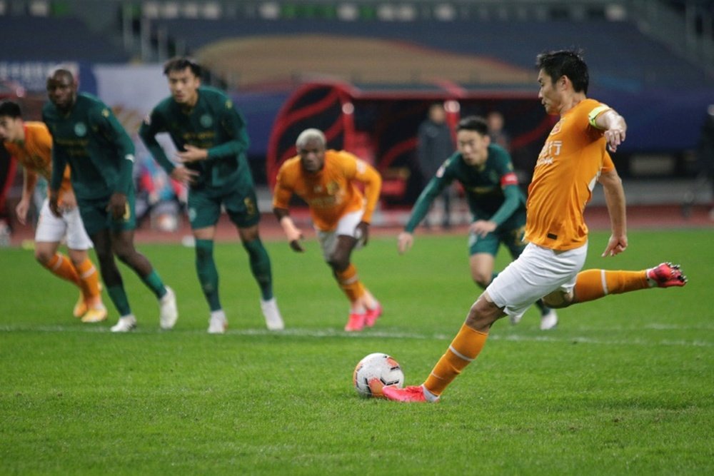Li Hang's penalty saw Wuhan Zall stay in the Chinese Super League. AFP