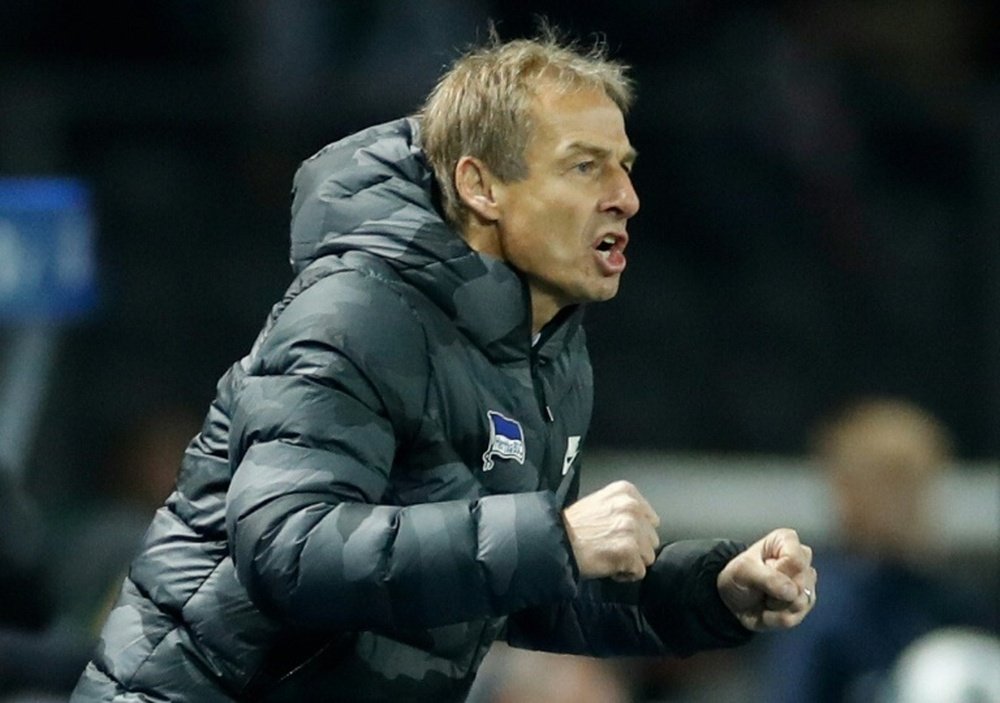 Jurgen Klinsmann could be fined if he does not show the DFL his coaching license. AFP