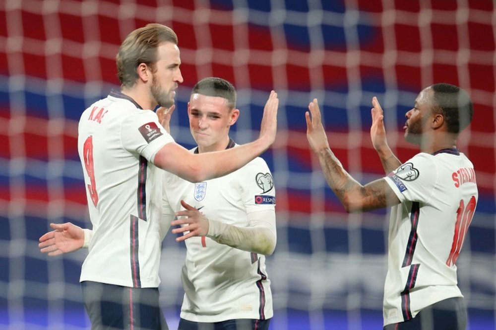 Harry Kane (L) scored as England beat Poland 2-1. AFP