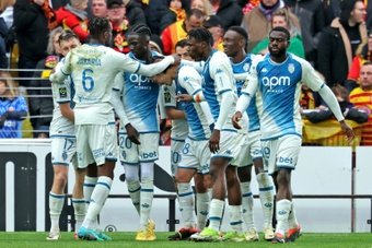 Japan striker Takumi Minamino scored in the second minute of added time to give Monaco a last-gasp 3-2 win at Lens on Sunday and lift the visitors to third in Ligue 1.