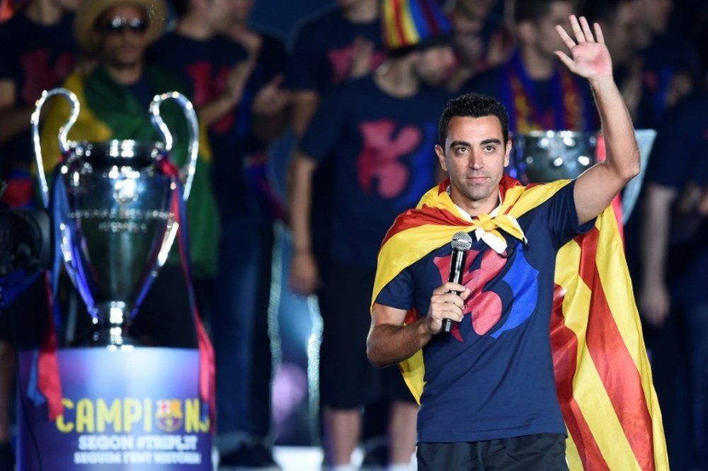 Xavi Hernandez left Barcelona in 2015 after winning the treble. AFP