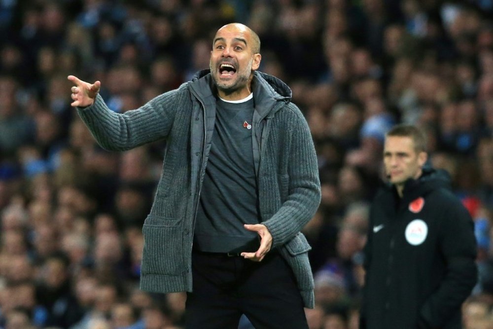 Pep Guardiola could face FA action over comments he made about referee Anthony Taylor. AFP
