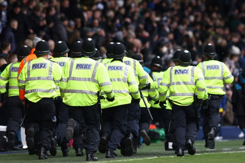 Wolves and West Brom fans fought a bloody battle in the stands. AFP